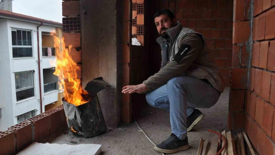 İnşaat işçilerinin soğuk kış günlerinde zorlu mücadelesi