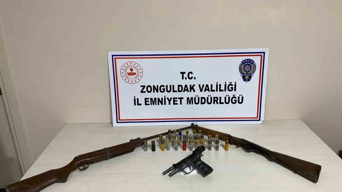 Polisin baskın yaptığı evde silah ve fişekler ele geçirildi