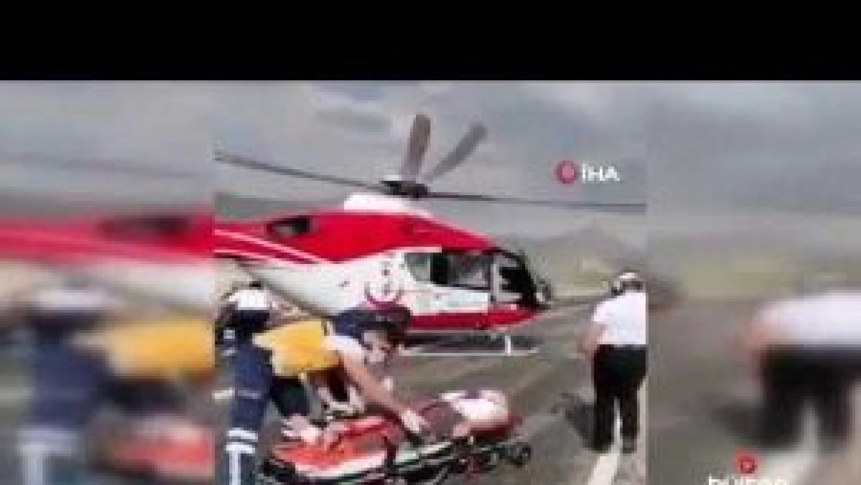 Ambulans helikopter kara yoluna indi