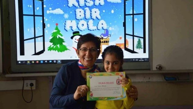 İlk karne heyecanını yaşadılar